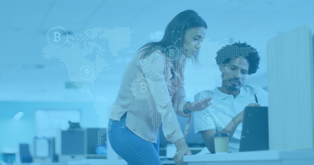 Image of world map with bitcoin symbols over diverse business people in office