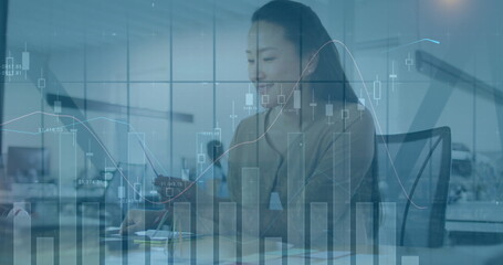 Image of financial data processing over diverse business people in office