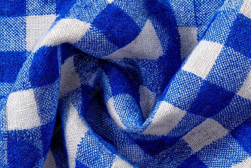Poster cotton fabric in blue and white check pattern close up showing texture and detail