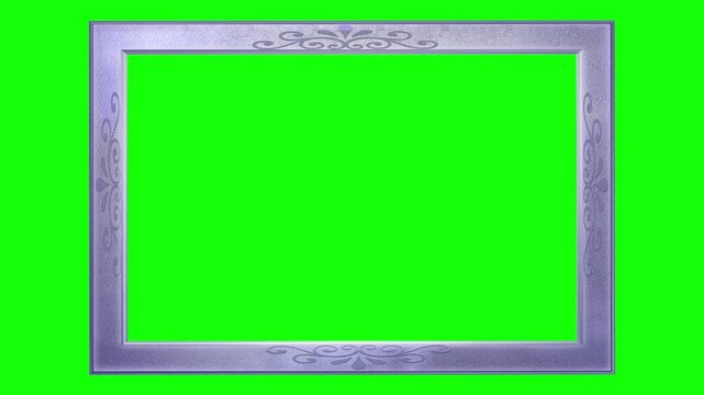 A decorative, light purple picture frame with ornate scrollwork and textured detailing on a Vibrant Green Screen Chroma Key Pro Video	
