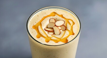 Creamy Banana Oat Smoothie with Honey Drizzle Almond Garnish