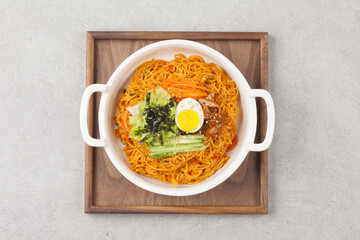Bibim guksu is a type of noodle dish that is eaten without soup, mixed with meat, vegetables, and...