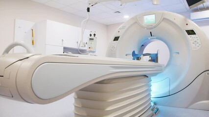  CT scanner or MRI machine in a hospital radiology center. Diagnostic equipment in a medical lab. - Powered by Adobe
