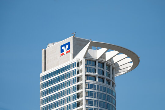 FRANKFURT, GERMANY - 14. May 2025: Volksbank tower building in FFM. The logo sign of the bank is on the exterior of the skyscraper. The Westend Tower was designed by the architects Kohn Pedersen Fox.