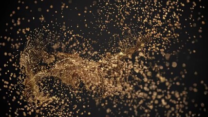 Golden particles are swirling, flowing, and rotating against a black background, creating a visually captivating display of motion and elegance