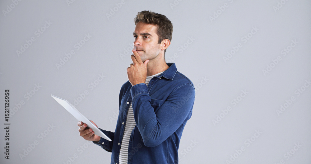 Poster thinking, tablet and businessman in studio planning for creative project with email for client appro