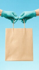 Two gloved hands exchange a brown paper bag against a blue background.