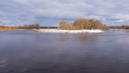 Flooding of the River on a Sunny Day in early Spring