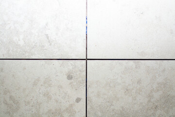 Close-up of ceramic tile installation before grouting
