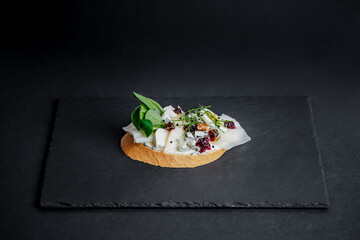 Decorated Open-Faced Sandwich isolated on black background