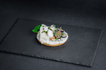 Decorated Open-Faced Sandwich isolated on black background
