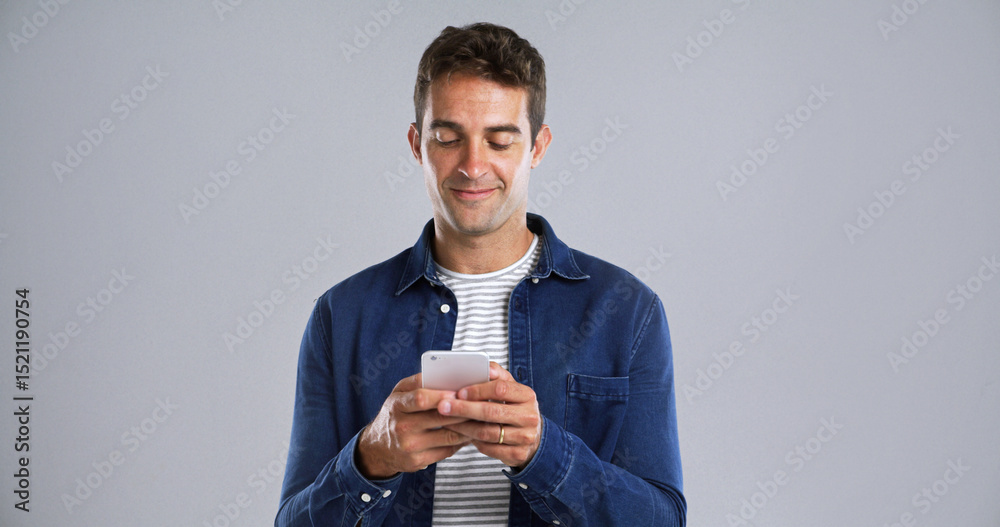 Poster smile, mobile and man in studio for text, typing or reading message on white background. phone, happ
