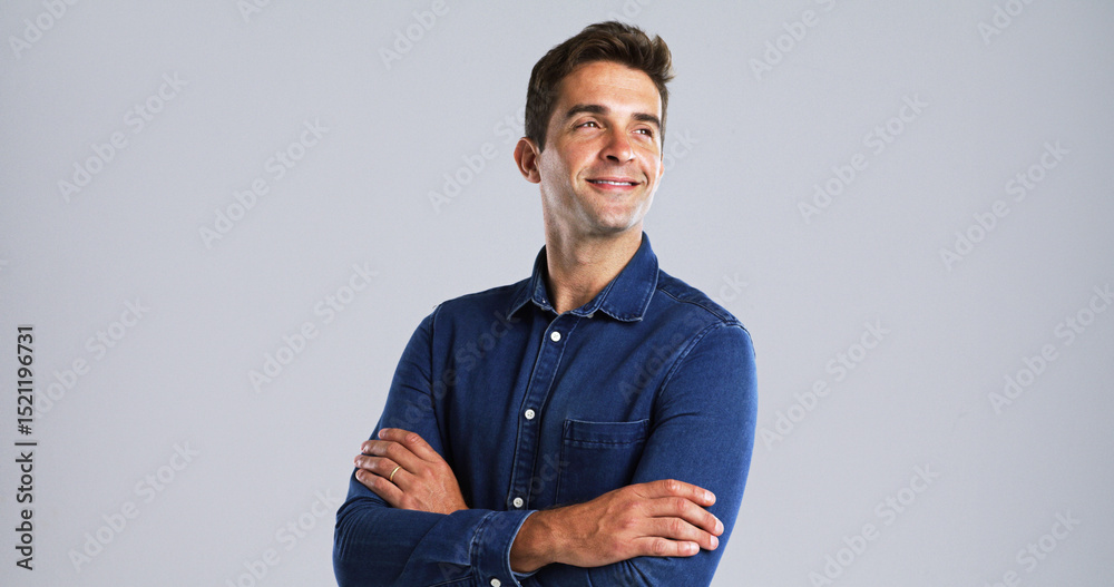 Poster Arms crossed, thinking and vision with man in studio for daydreaming or memories on mockup space. Future, ideas and smile with thoughtful person on white background for problem solving or solution