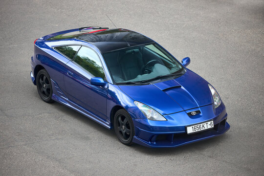 Minsk, Belarus - May, 24 2025: Toyota Celica Seventh 7th generation T230 230 VII 1999 - 2006 blue shark 3 door liftback coupe upper three quarter view.