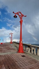 Naklejka premium Typical red rings in the port of La Coruña, maritime tourism, sunrise in Galicia, Spain