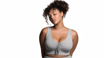 Curvy dark skinned woman with curly hair and light grey outfit is posing with closed eyes and transparent background, ideal for fashion and advertising projects