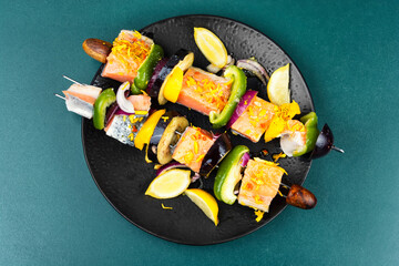 Skewers of fish salmon kabobs.