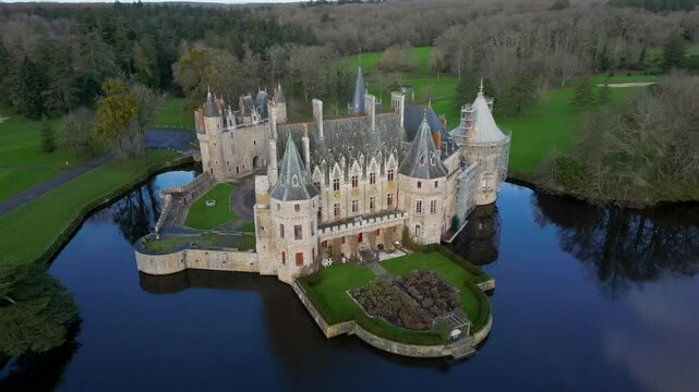 Aerial drone footage of a beautiful castle on a river, Chateau de la Bretesche