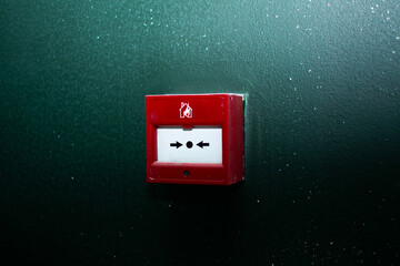 Close-up of a fire alarm button on the wall, device for emergency fire call
