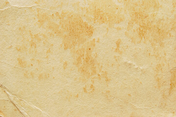 A sheet of rough brown glued cardboard texture as background