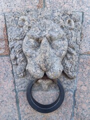 bas-relief of a lion made of granite