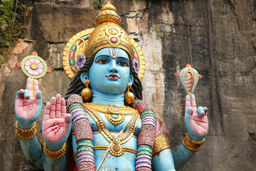 Four-armed statue of Hindu god Vishnu, detailed portrait, divine deity, Indian sculpture,...