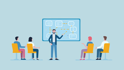 Man presenting flowchart to seated audience in a meeting room with light blue background color tone