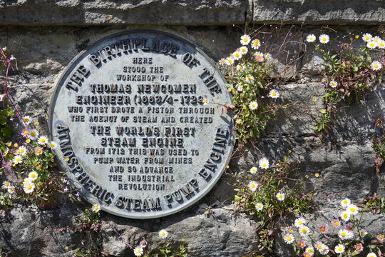 Memorial plaque to the workshop of Thomas Newcomen, inventor of the steam engine. Dartmouth, Devon, England, UK. May 2025. 