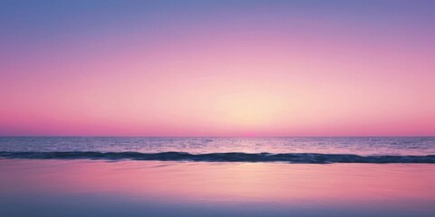 Tranquil Ocean Sunset with Soft Pink and Purple Skies Reflecting on Calm Water Surface at Dusk