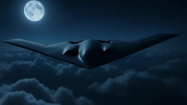 B-2 Spirit Stealth Bomber Flying a Covert Night Mission Above Clouds
