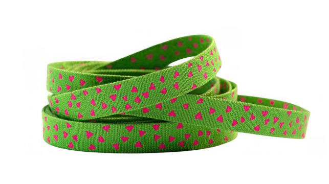 Green elastic ribbon featuring small pink hearts is loosely rolled and presented against a transparent background, perfect for creative projects and designs - Powered by Adobe