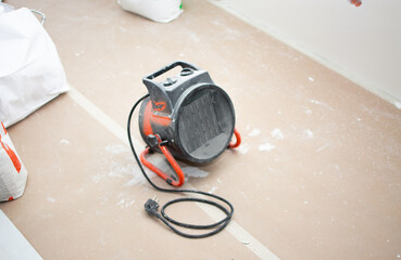 Wall dryer on a construction site after painting used to speed up drying and improve finish quality
