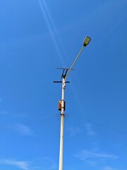 street lamp on blue sky