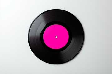 Vinyl record with empty pink label on white background. Top view.