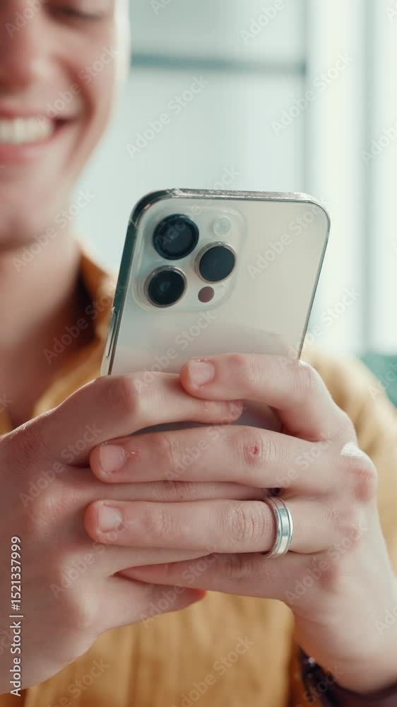 Poster Happy man, hands and scroll on mobile for social media, meme website and text message in home. Person, phone and laugh in living room for notification, good news and chatting on networking platform