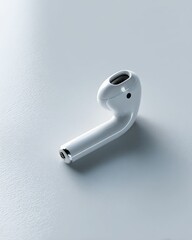 Wireless Earbud Product Shot Minimalist White Airpod Design on Bright Surface