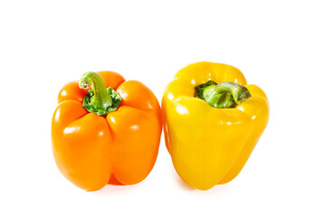 Fresh juicy shiny yellow and orange bell peppers.