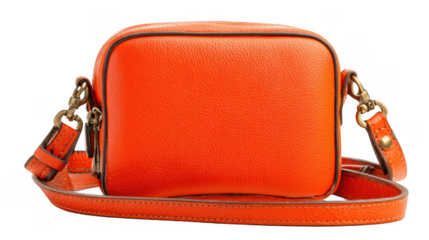 Studio shot of a vibrant orange leather crossbody bag, showcasing its stylish design and transparent background, perfect for showcasing on various platforms