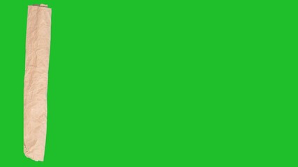 Ripped Craft-Paper Crumple Transition. Hand-torn kraft paper crumples then rips away in textured stop-motion, revealing clean alpha beneath. - Powered by Adobe