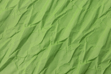 Abstract wrinkled green crumpled paper texture background