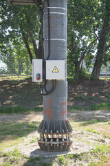 electric post with electric meter box, crown high mast