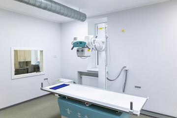 An innovative, multifunctional X-ray diagnostic system, providing high image quality and flexible X-ray examinations, stands in a sterile medical room.
