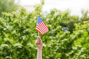 Waving an American flag at Independence Day 4th of July