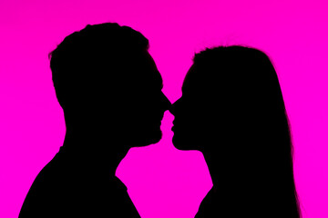 Silhouette of Couple Sharing a Romantic Moment Together