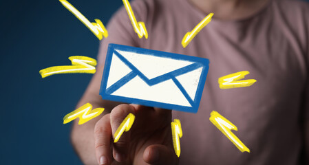 Hand holding a digital email icon.  Fast communication, inbox, message.