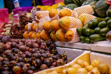 Lots of exotic Thai fruits on the shelves at the Phuket Night Bazaar