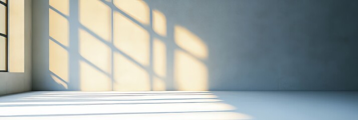 Obraz premium Bright and Airy Room with Natural Light Creating Intriguing Window Shadows on the Wall Design