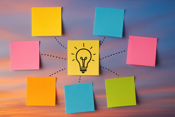 Plakat A strategic concept illustrated by colorful notes connected to a central idea symbolizing creativity and planning in business