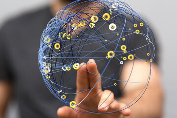 Abstract image of a person interacting with a digital network. Represents global connections, data,...