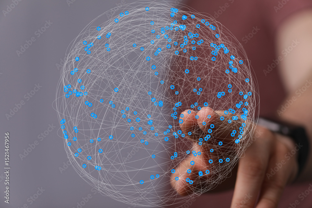 Aufkleber Abstract image of a hand interacting with a digital sphere representing global network connections.